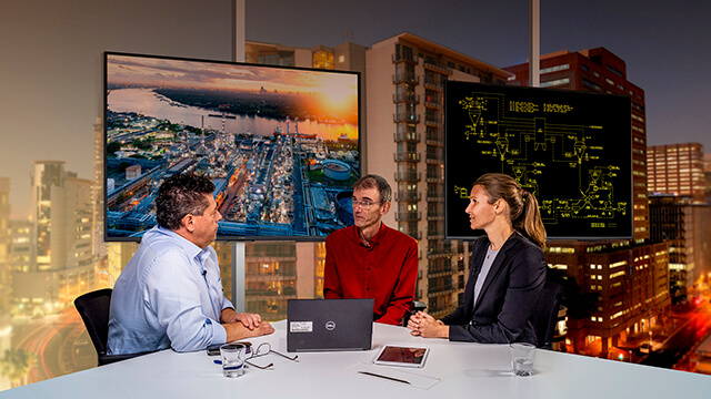 engineers and contractor discussing at table