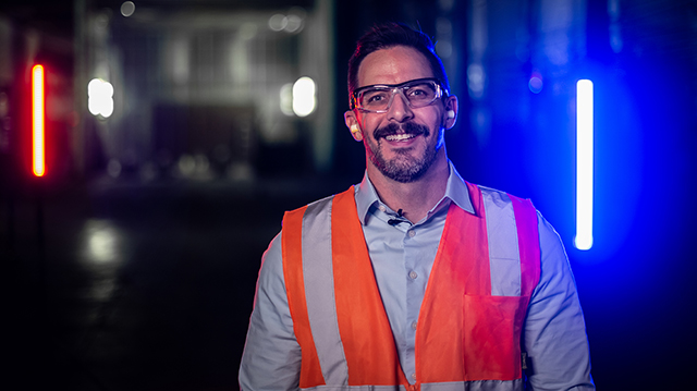 smiling engineer in data center.jpg